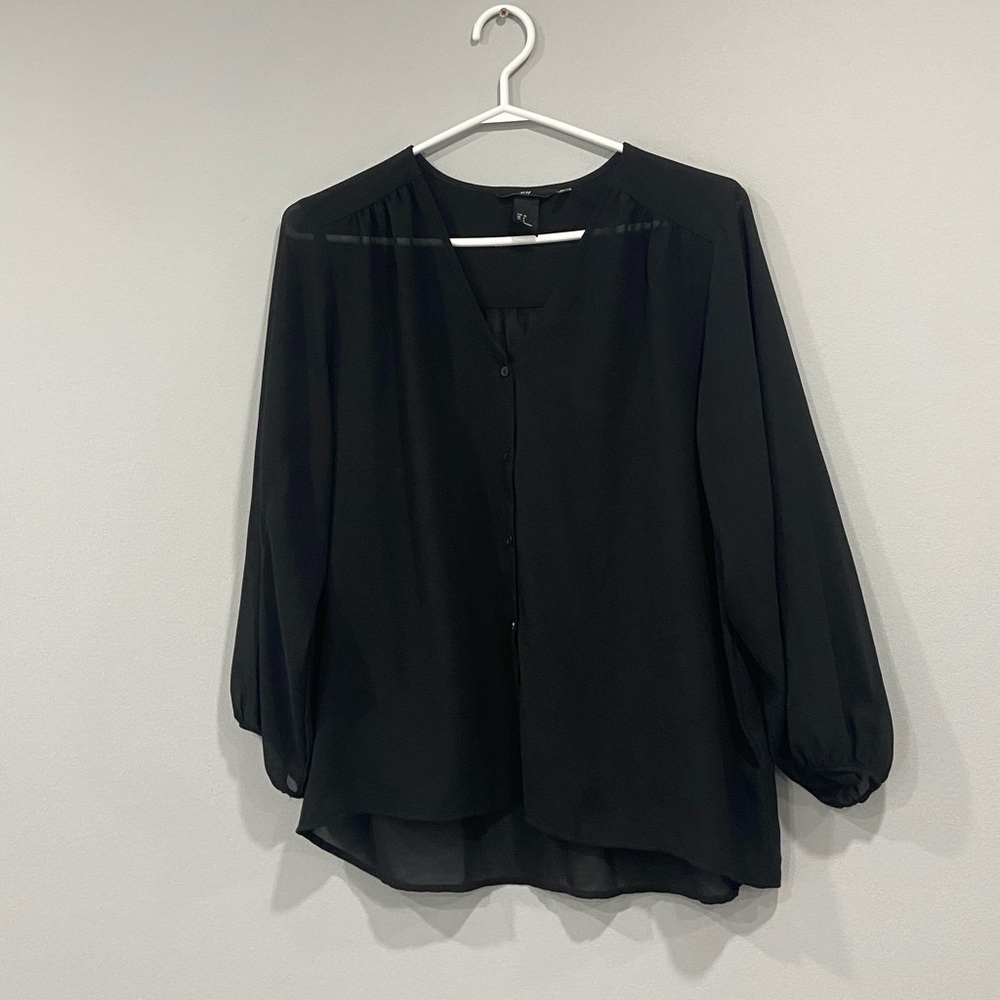 Sheer black blouse
